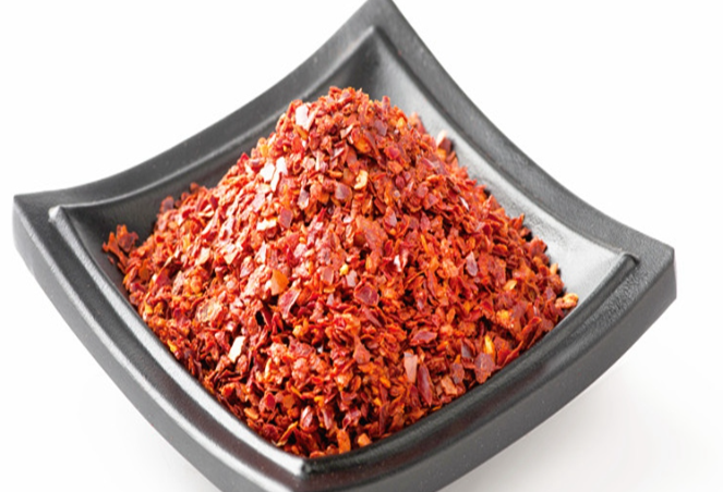 Hot pepper flakes gochugaru in bibimbap sauce Hot pepper flakes gochugaru in bibimbap sauce